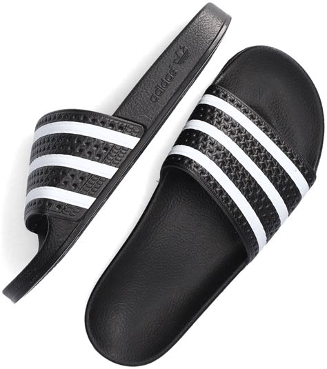 adidas adilette slipper zwart grijs|adidas water slippers.